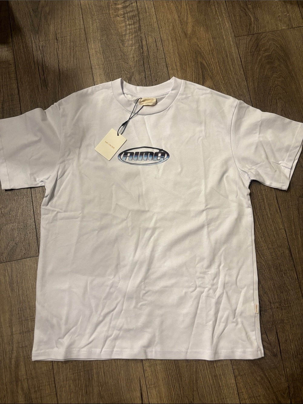 Aime Leon Dore White Short-Sleeve Tee with Blue Oval Logo